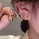 Paire de boucles d'oreilles dorés