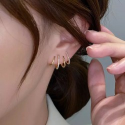 Paire de boucles d'oreilles dorés